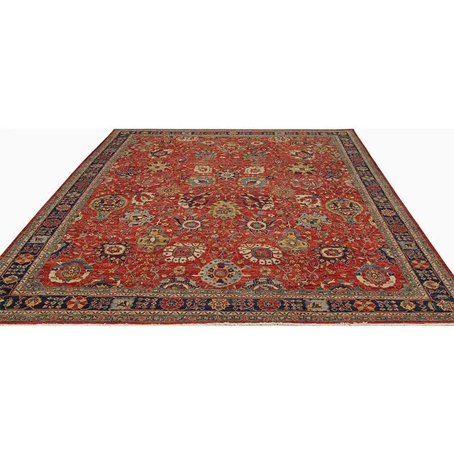 ACTUAL SIZE: 12’1″ x 15’6″ PRIMARY COLOR: Rust / Navy AGE: New (It's made in 1990s and never been used) ORIGIN: Pakistan...