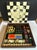 Vintage board game set box for Dal Negro by Piero Fornasetti, made in Italy in the 1970s. The box is made in walnut wood,...
