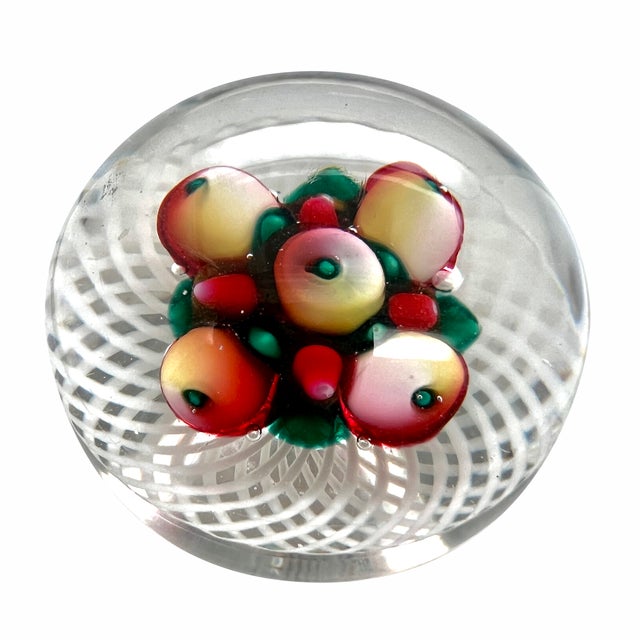 A fine 19th century paperweight by the Sandwich New England Glass Co. It is fruit on latticinio and beautifully crafted....