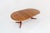 Vintage Danish round extendable dining table from the 1960s made of solid teak wood. This Danish dining table can be...