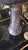 Ceramic vase/candle holder with a tall, truncated conical base, surmounted by a wide circular bowl and a cylindrical...