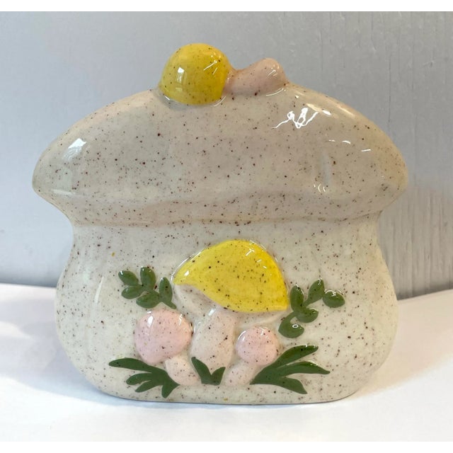 Love this cute mushroom motif ceramic napkin holder! Signed on bottom.