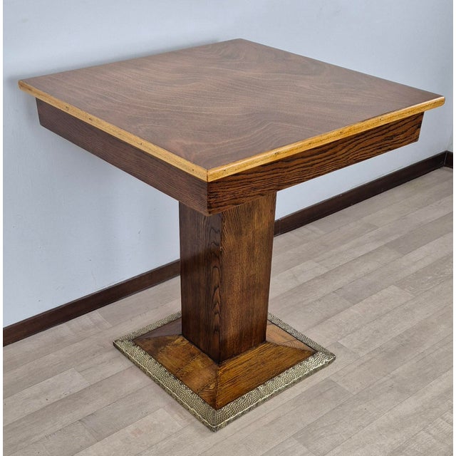 Characteristic Viennese Art Deco coffee table (one of the few remaining) in oak burl and blond beech. The square-section...