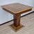 Characteristic Viennese Art Deco coffee table (one of the few remaining) in oak burl and blond beech. The square-section...