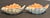 A charming pair of vintage Fitz and Floyd conch shell bowls, beautifully sculpted with organic forms and distinctive...