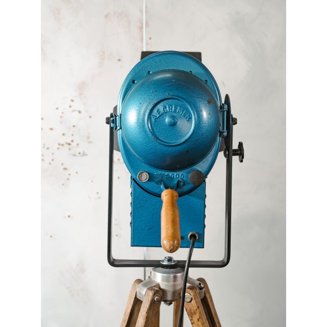 A rare blue theater spotlight by a.e. Cremer of paris, complete with its original barndoors and ventilation tray, mounted...