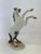Majestic Vintage Nymphenburg Hand-Painted Porcelain Rearing Stallion Figurine Signed by August Göhring This exquisite...