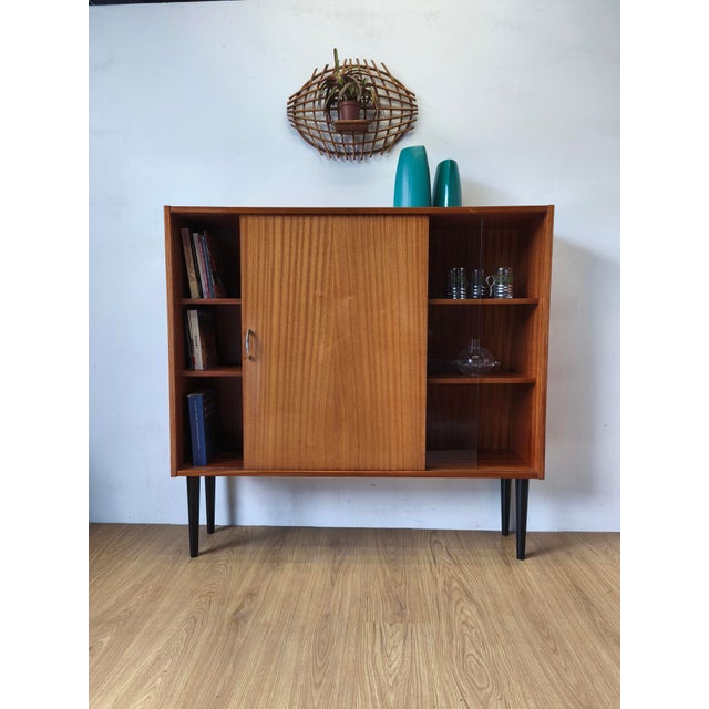Modernist sideboard, bookcase from the 1970s. Simple and minimalist. Original condition. Some scratches, discolorations,...