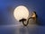- Sconce with spherical opaline glass shade - Manufactured and designed by Abo Metalkunst - Style reminiscent to Hans Agne...