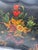 Scalloped Hand Painted tole tray with vivid rich colors of rust, red, green, yellow on black background with gold scrolls....