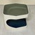 A 1970s-era two-tier coffee table with a hexagonal shape, rounded corners, and a C-shaped frame. The top extends on one...