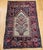 This exquisite antique Anatolian village prayer rug from the early 20th century features a refined Tree of Life...
