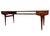 This vintage Mid Century Modern coffee table showcases design elements commonly associated with Danish modern furniture of...