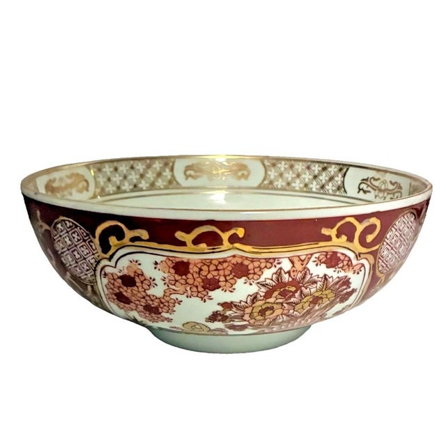 For your consideration is a vintage hand painted Japanese porcelain bowl. Finished in a rich iron red with heavy gilding,...