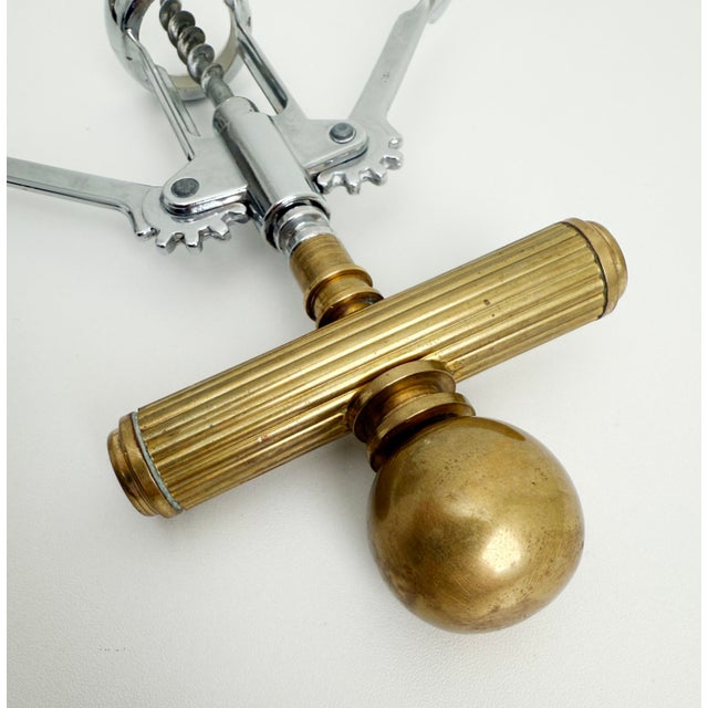 Vintage corkscrew wine bottle opener attributed to Maxwell Phillips and produced in the 1970s. Nice weight in hand due to...