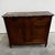 This Art Deco sideboard, dating from the early 1920s or 1930s, is a piece of refined cabinetmaking that exemplifies the...