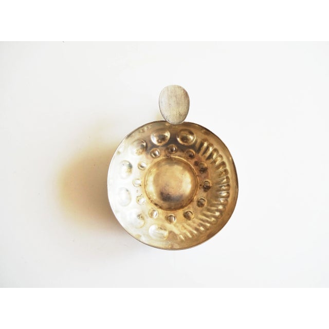 An antique French sommelier wine tasting cup / tastevin / wine porringer, in silver plate, with a ring and thumb holder. 4...