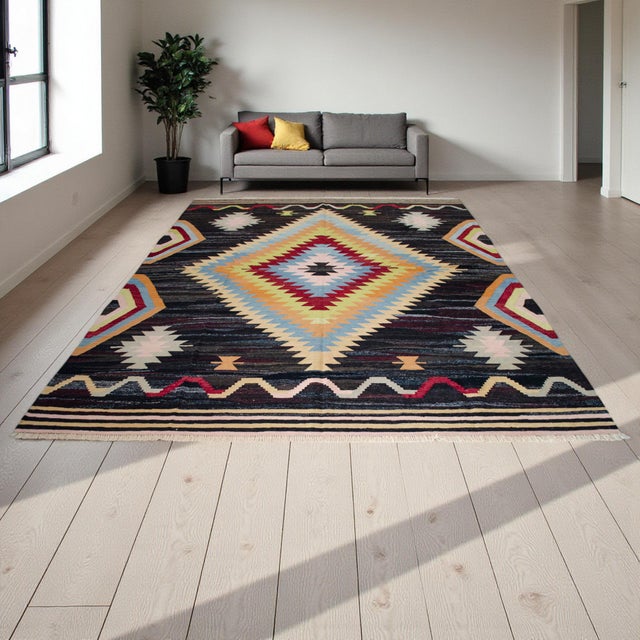 Woven in contemporary workshops in Oushak, one of Turkey’s historic centers of rug and kilim production, this large...