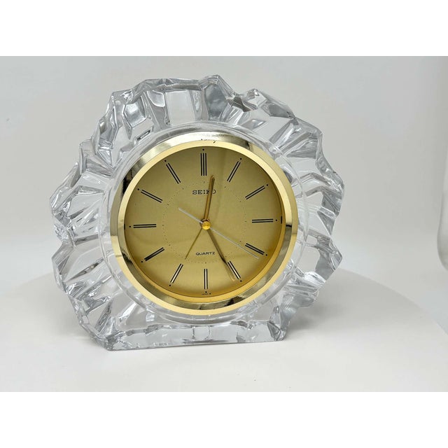 A striking vintage Seiko quartz desk or mantel clock, made in Japan circa 1980s, featuring a substantial clear faceted...