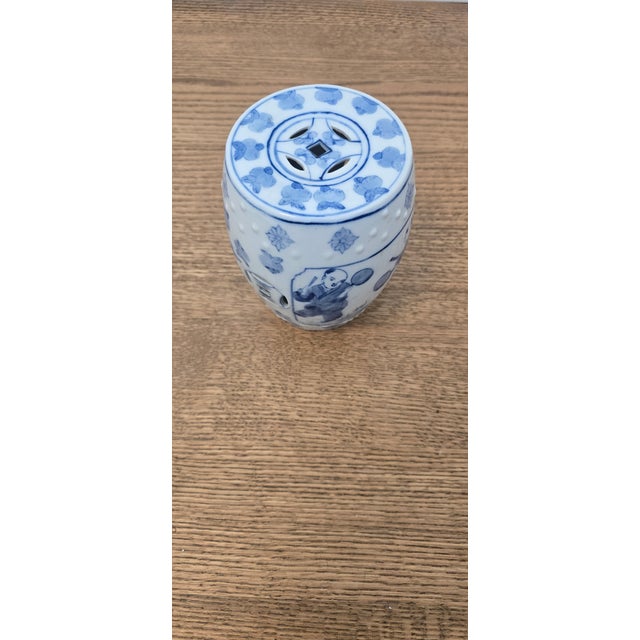A charming small-scale Chinese blue and white porcelain barrel form, modeled after a traditional Chinese garden seat in a...