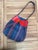 Elegant Delvaux Faust handbag crafted in the iconic Toile de Cuir, a refined combination of durable coated canvas and...