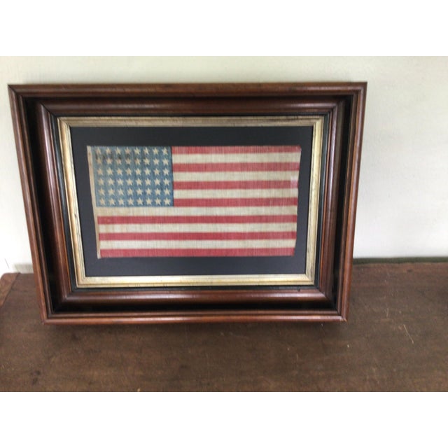 This 48 Star American Flag is from the 1920s and is made from cotton gauze fabric. This flag is in good condition with...