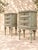 An elegant pair of Louis XVI style bedside tables, dating from the early 20th century, with a beautiful, soft, and...