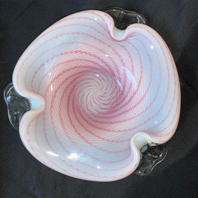9” x 9” This is a Murano art glass candy dish or bowl, manufactured in Italy.Design: The bowl features a distinct pink and...