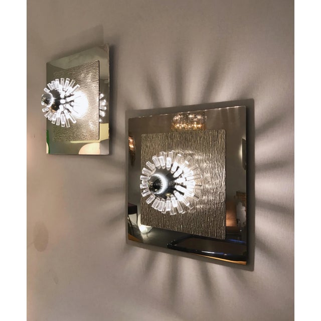 Rare large pair of wall lights sconces panel in polished and hammered stainless steel with metal ball and Lucite rods that...