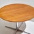 Coffee table with ash top and four-legged steel base from the 1970s. The surface of the table has scratches, stains and...