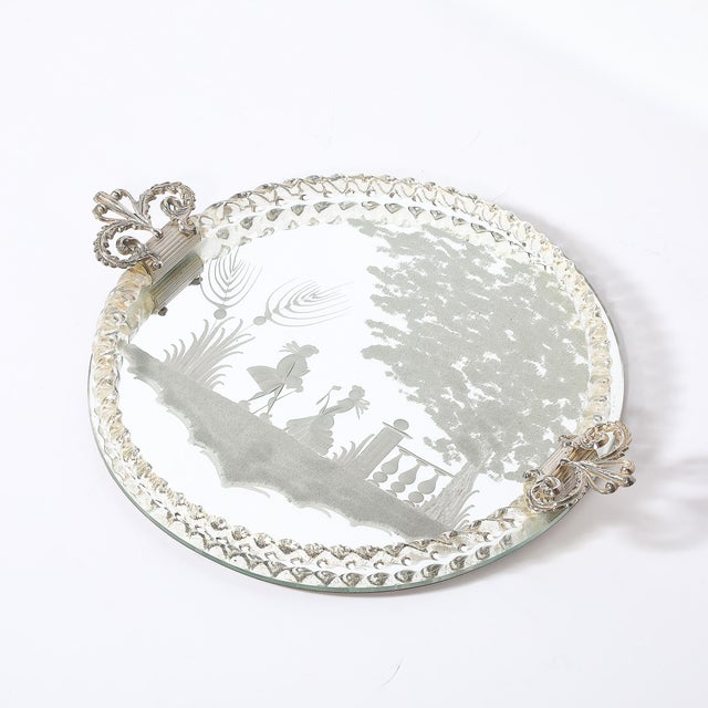 Art Deco reversed-etched glass tray featuring a finely detailed pastoral scene at its center, originating from Italy,...