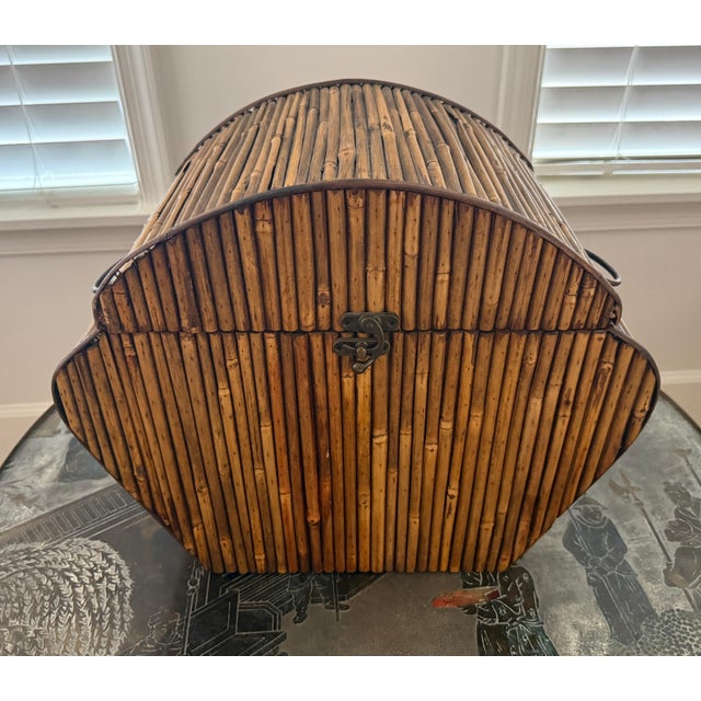 Large split reed bamboo box. Brass Closure and brass rings to both sides. Curved shape.