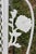 White Wrought Iron Patio Set—Four Armchairs and a Table With a Glass Top For Sale - Image 8 of 18