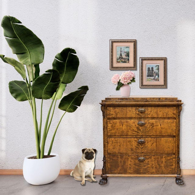 Pair of hand-colored French etchings by Le Bailly, depicting the Eiffel Tower and Notre Dame Cathedral. Signed in pencil...