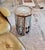 An exceptional mid-19th century Syrian octagonal side table, meticulously handcrafted in Damascus and richly adorned with...