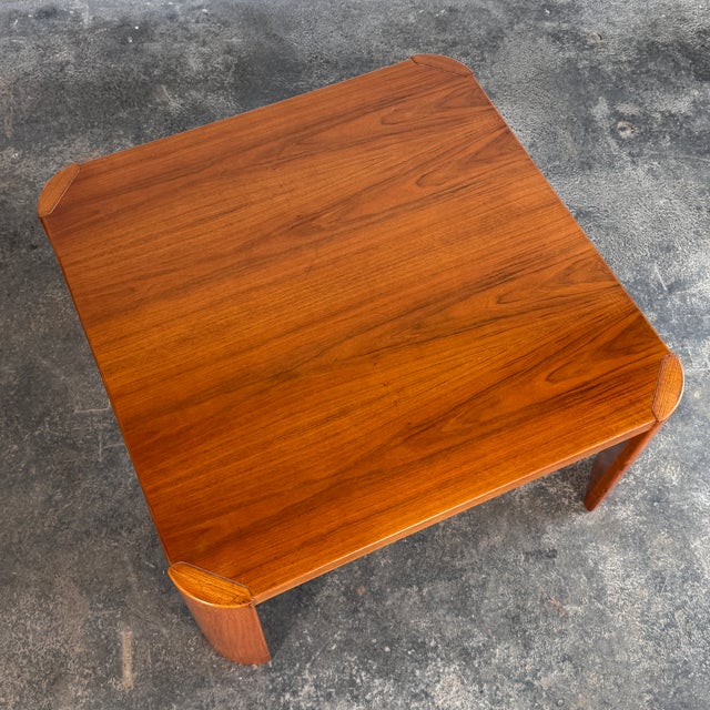 This beautiful square coffee table is a wonderful example of Scandinavian-influenced mid-century modern furniture design...