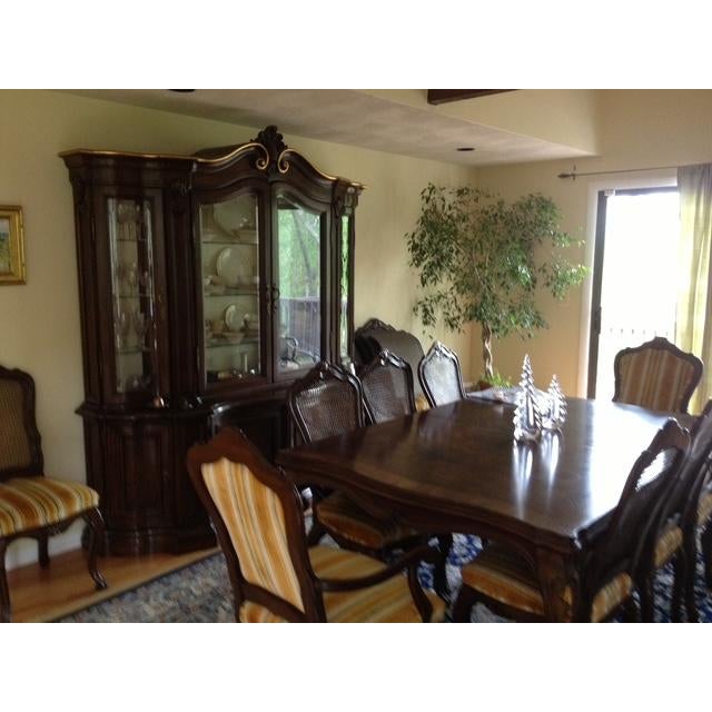 Impressive vintage china and display cabinet by Karges Furniture, crafted in walnut in the French Louis XV style. The...