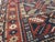 Early 20th Century Galerie Shabab Collection Distressed Caucasian Rug With a Tribal Design in Rust, Dark Blue, and Cream For Sale - Image 5 of 8