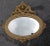 French Louis XVI Style Giltwood Decorated Oval Wall Mirror For Sale - Image 3 of 8