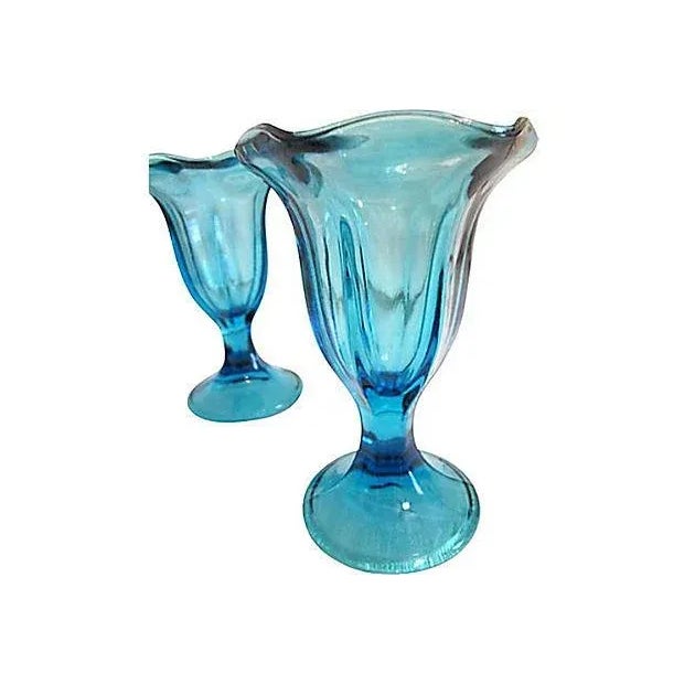 Lovely midcentury set of six parfait glasses, four blue and two clear.