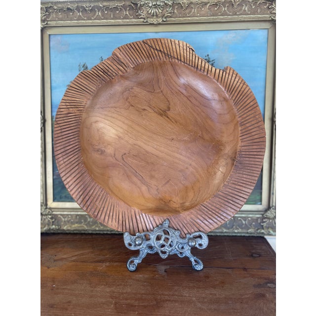 Striking mid-century solid wood bowl, hand-carved from a single piece of richly grained hardwood. This sculptural piece...