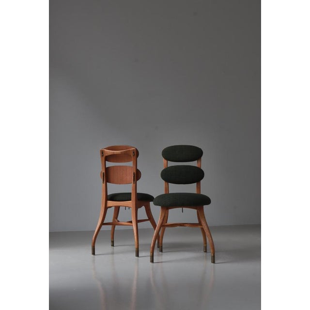 Pair of rare Vilhelm Lauritzen "Musician Chair" in oak, brass and original dark green upholstery. Architect Vilhelm...