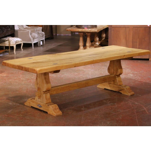 Crafted in France circa 1870, this handsome antique trestle table exemplifies the understated strength and authenticity of...