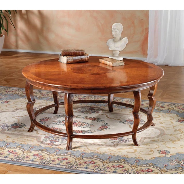 Country French Coffee Table. Handcrafted in Italy from solid walnut, this exquisite table captures the essence of classic...
