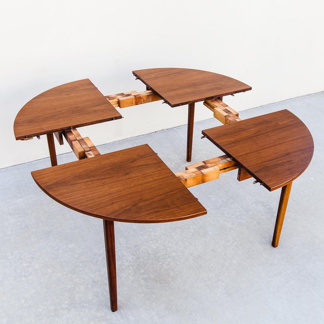 Vintage mid century two-way expandable dining table, made in Denmark c. 1960s and newly restored to showroom condition....