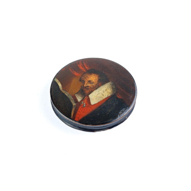 Description: German Papier Mache Snuffbox attributed to Stobwasser. With a painted knight on the lid Date: 18th Century...