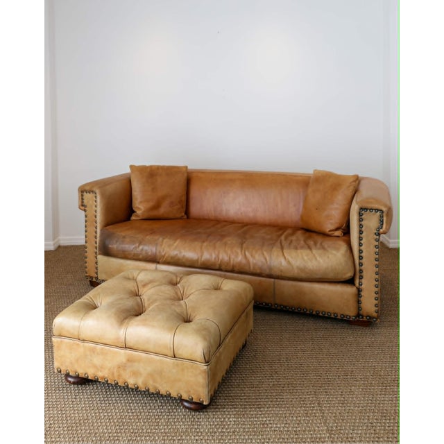 A classic piece from Ralph Lauren Home's sought-after Writer's Collection, this tufted leather ottoman was manufactured by...