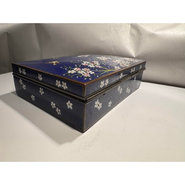 This listing is for an antique Japanese vanity box. The box features a very high quality cloisonné enamel exterior with...