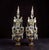 An imposing pair of neoclassical pinwheel candelabras from the louis xvi era, late 18th century. The wooden base is...