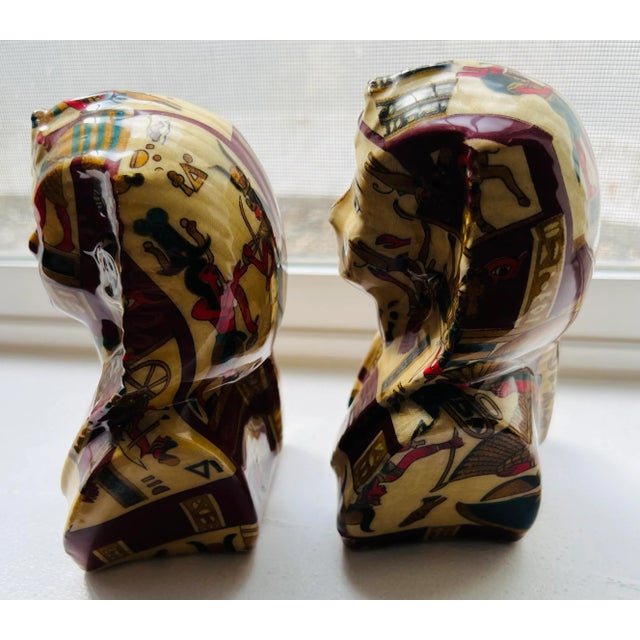 This is a pair of unique faux decoupage Egyptian bookends. The colorful pair is in pristine condition. Each piece measures...